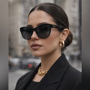 Prada Elegant Black Sunglasses